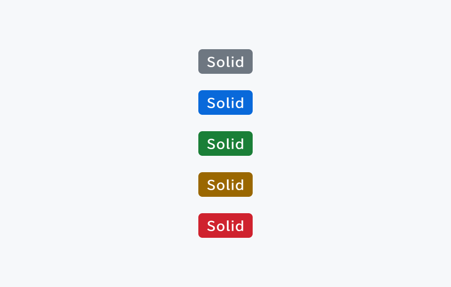 SolidスタイルのTag。グレー、青、緑、黄、赤の5つの背景色に、それぞれ白のテキストで構成されたTagを示しています。